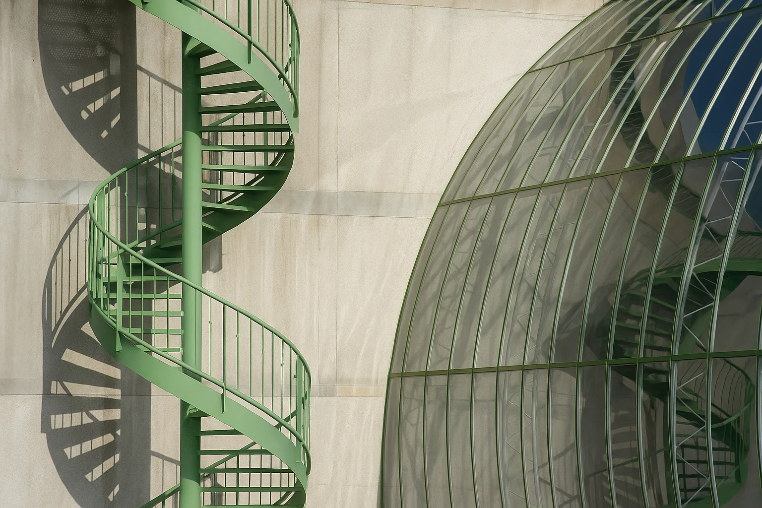 Green Spiral Staircase and Glass Dome in Modern Architecture