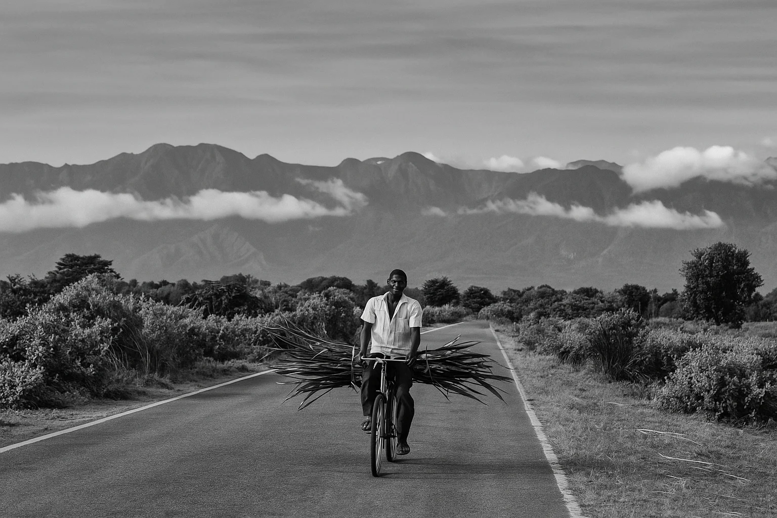 Villager Cycling Through Mountain Landscape