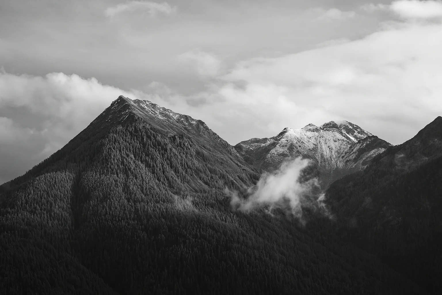 Black and White View of Misty Mountain Peaks